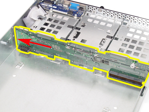 This picture illustrates how to slide the backplane board toward the left side chassis wall.